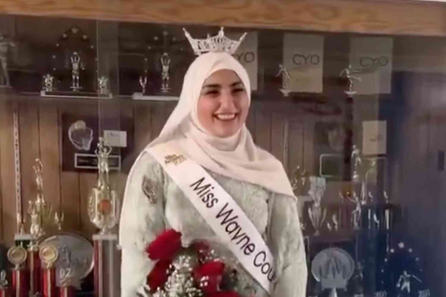 Thumbnail for Woman Becomes First Winner Of Michigan Beauty Pageant To Wear Hijab